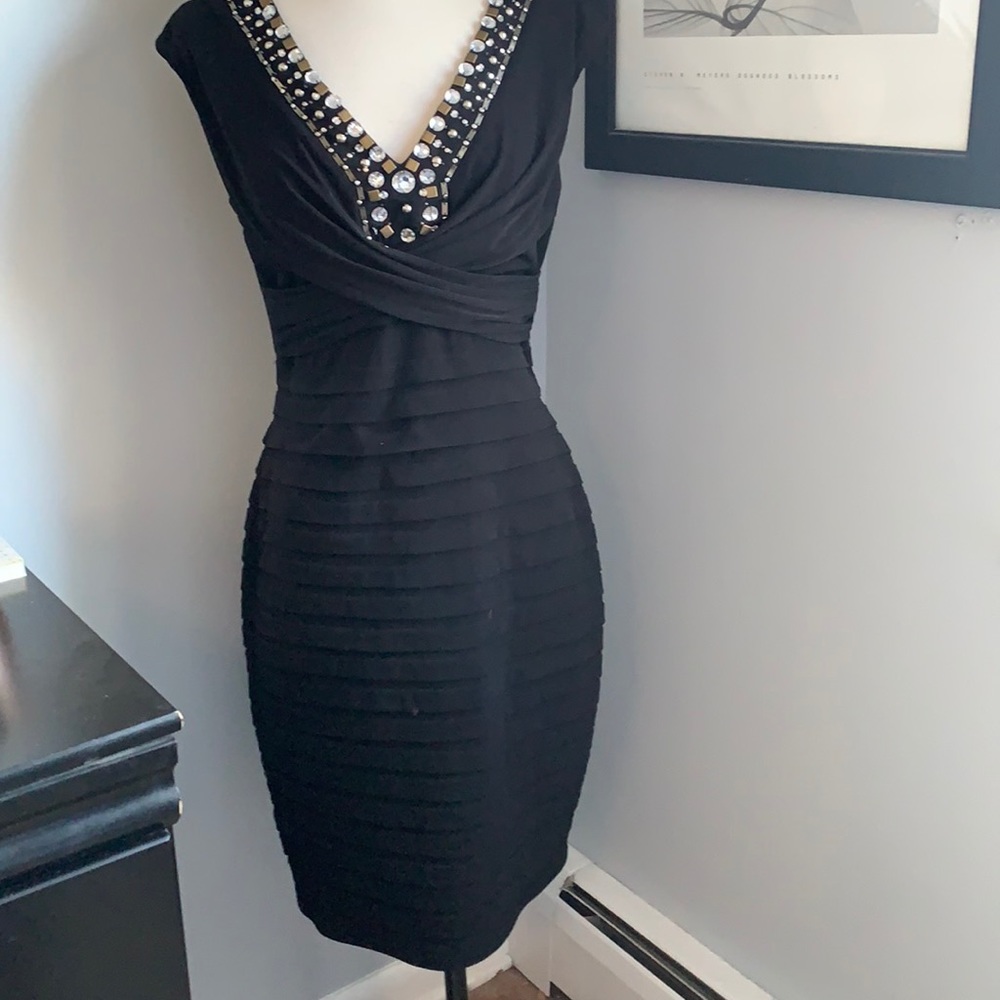 Deep V neck jeweled black dress, very flattering!